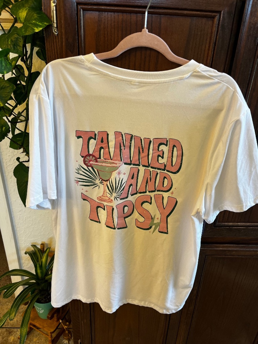 Women’s tee shirt. Cocktail tanned and tipsy.